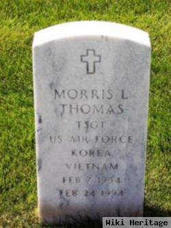 Morris L Thomas